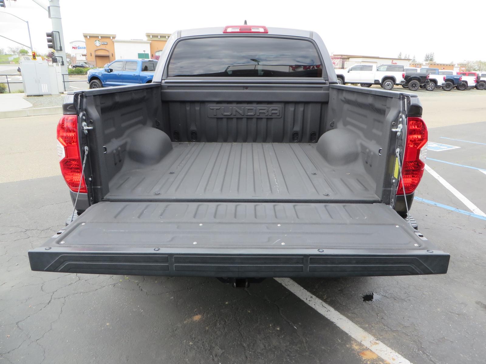 2021 CHARCOAL /GREY Toyota Tundra SR5 (5TFDY5F16MX) with an 5.7L V8 OHV 16V engine, automatic transmission, located at 2630 Grass Valley Highway, Auburn, CA, 95603, (530) 508-5100, 38.937893, -121.095482 - Features a Zone Offroad level kit, 20" SOTA wheels, 35" Nitto Ridge Grappler tires, Fox rear shocks, Air bags, front and rear TRD sway bars, and Window tint. - Photo #13